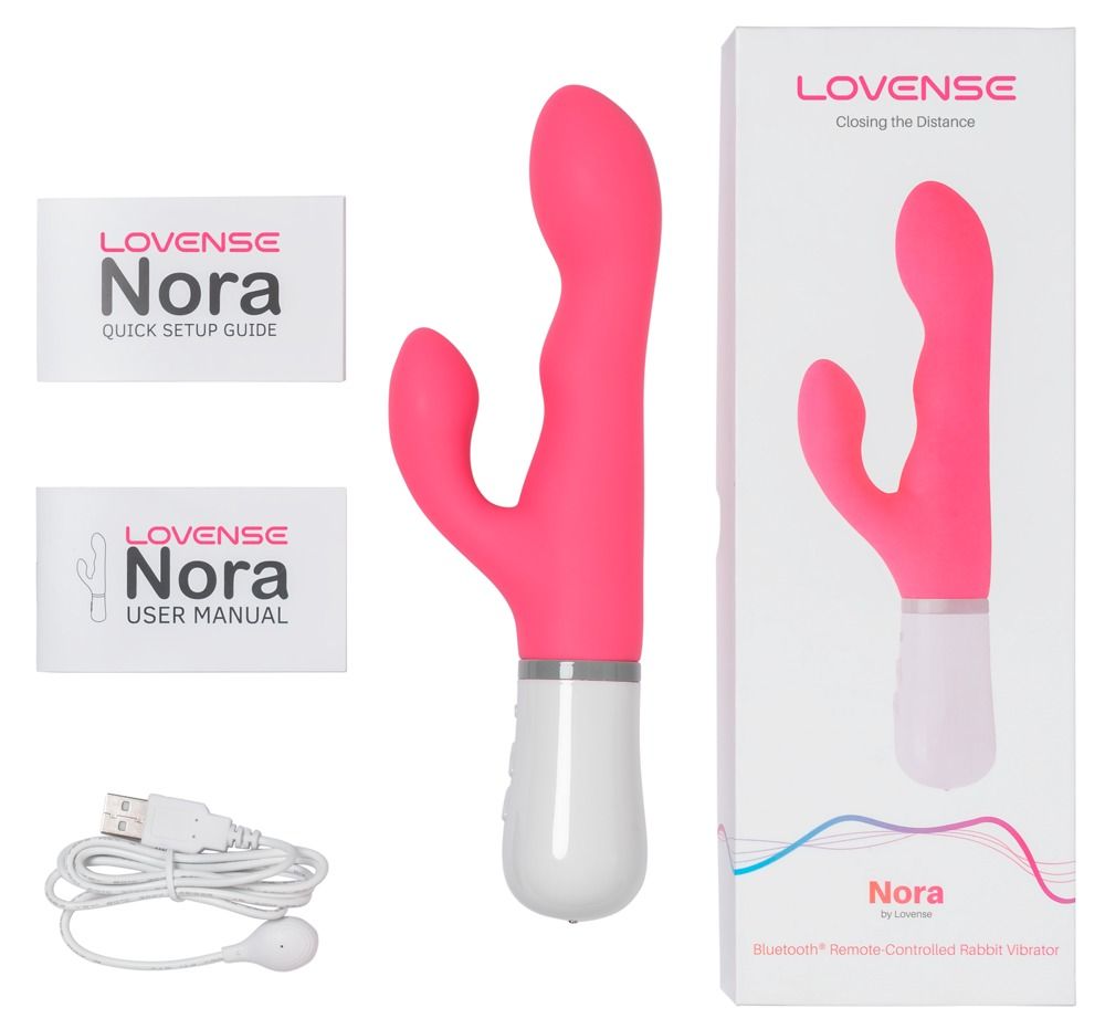Rosa Vibrator, Bedienungsanleitungen, Ladekabel und Verpackung. Produktname 'Nora' auf der Verpackung.