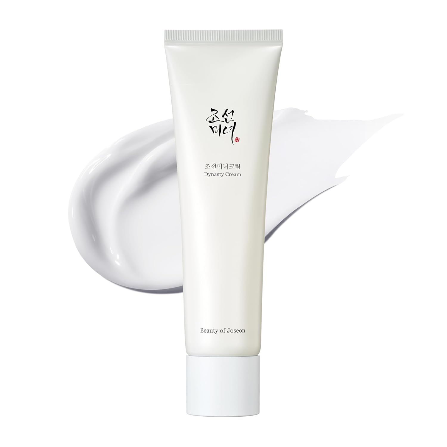 Weiße Tube Dynasty Cream. Creme-Ausstrich daneben. Text: Dynasty Cream, Beauty of Joseon.