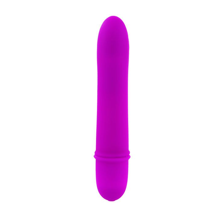Lila Vibrator. Zylindrische Form mit abgerundeter Spitze. Basis mit Ring. Glatte Oberfläche.