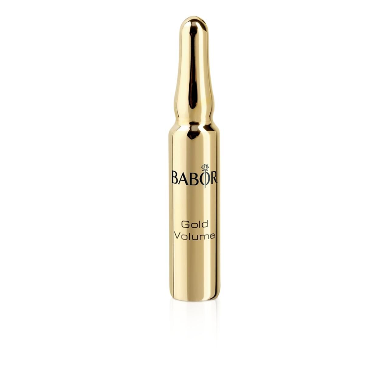 Goldene Ampulle mit Aufschrift: Babor, Gold Volume. Auf weißem Hintergrund.