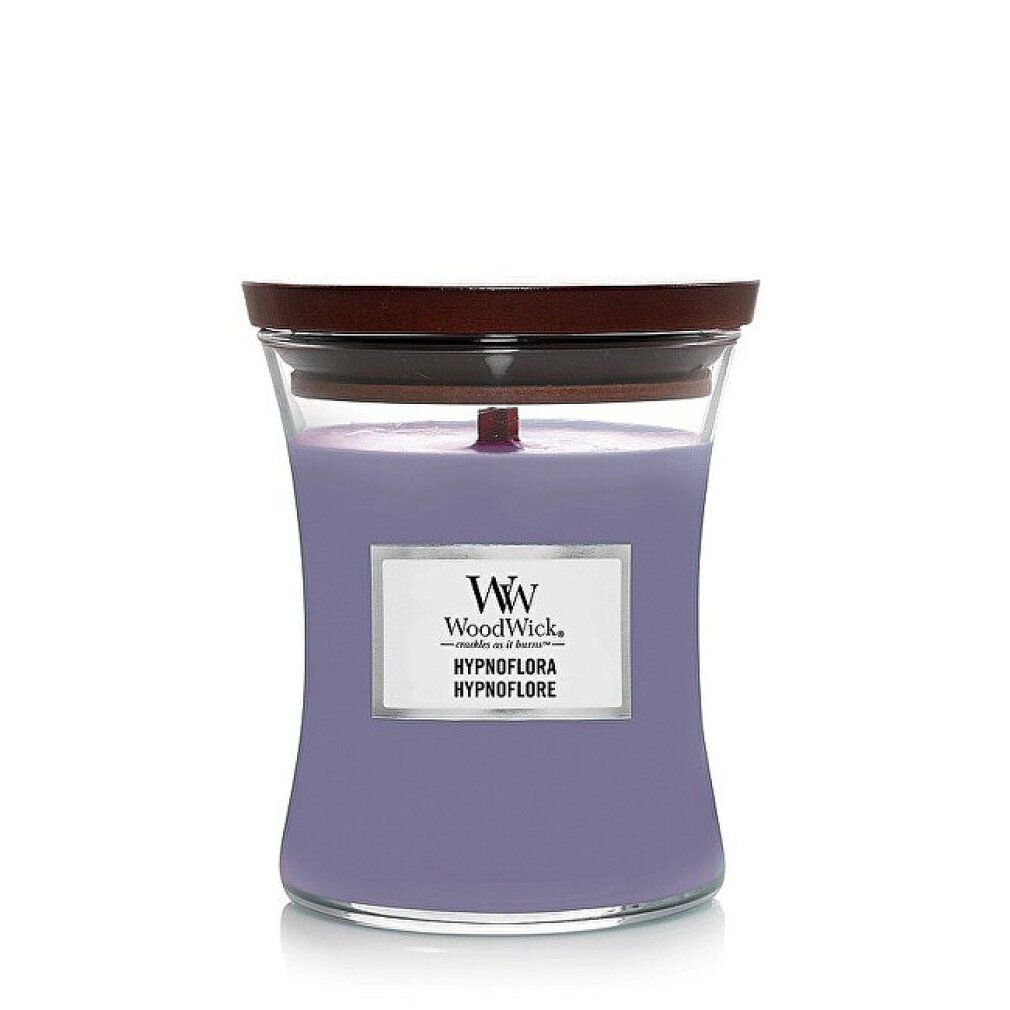 Kerze mit Holzdocht, Glasbehälter, Holzdeckel. Etikett mit "WoodWick", "HYPNOFLORA". Violette Wachsfarbe.