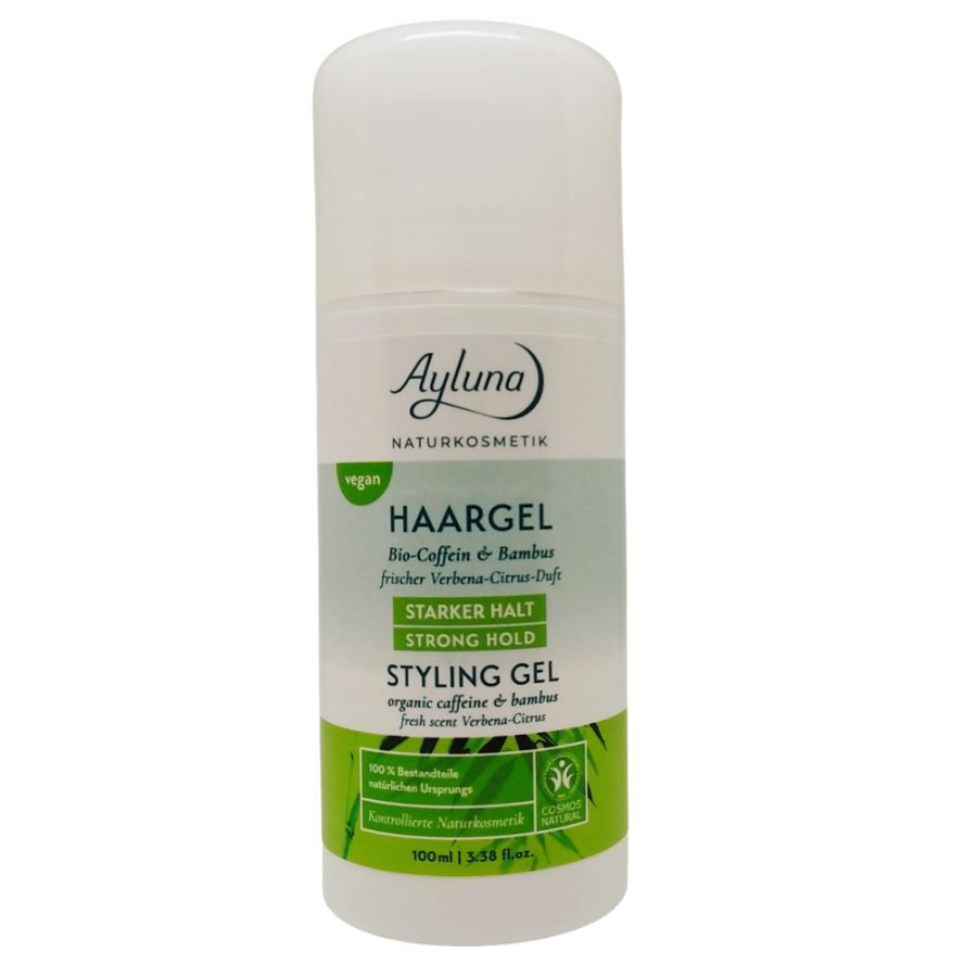 Weißer Zylinder mit Produktinformationen. Aufschrift: Ayluna, Haargel, Bio-Coffein & Bambus, starker Halt, Styling Gel. Vegan-Siegel.