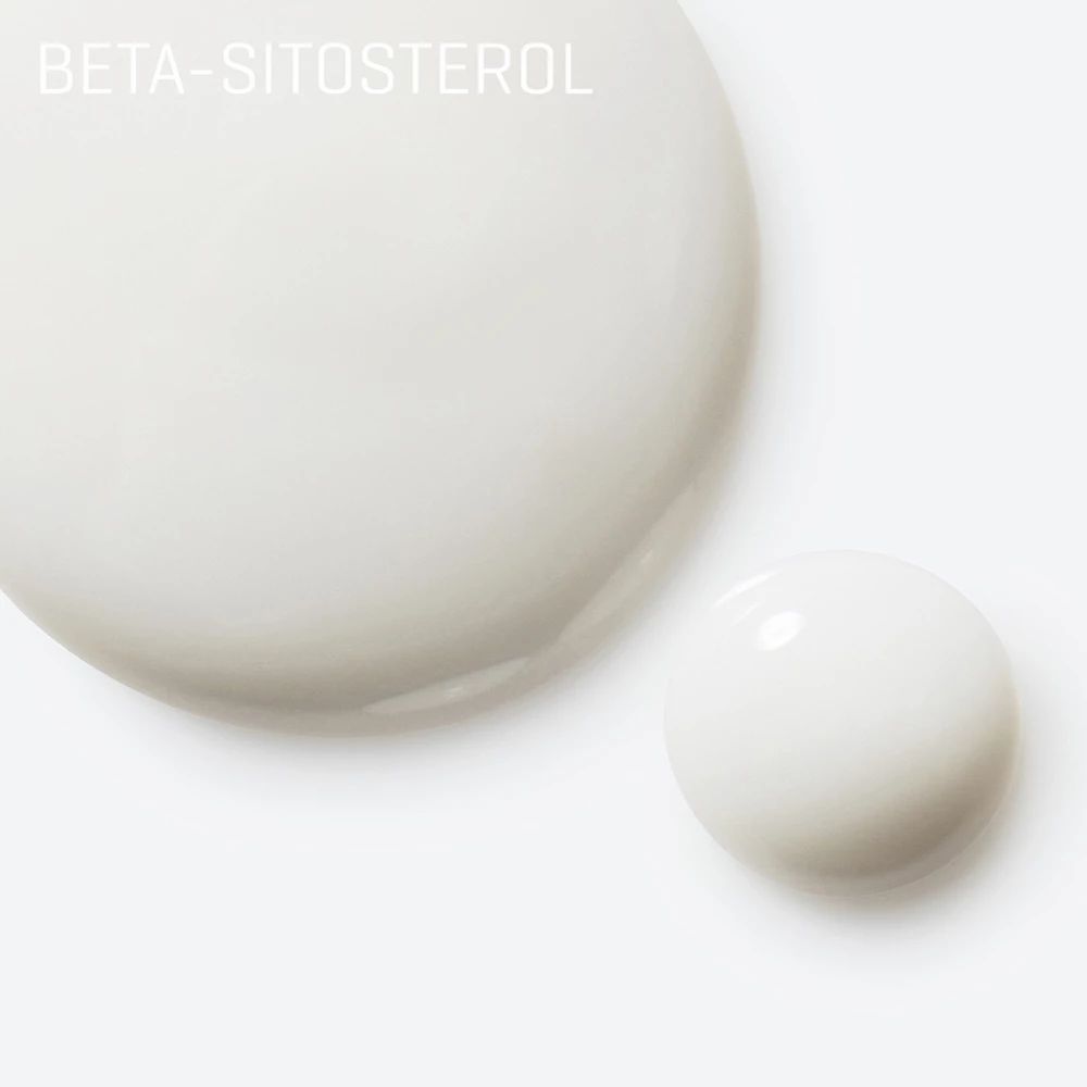 Nahaufnahme von zwei weißen Serumtropfen. Beschriftung: Beta-Sitosterol. Hintergrund: weiß.