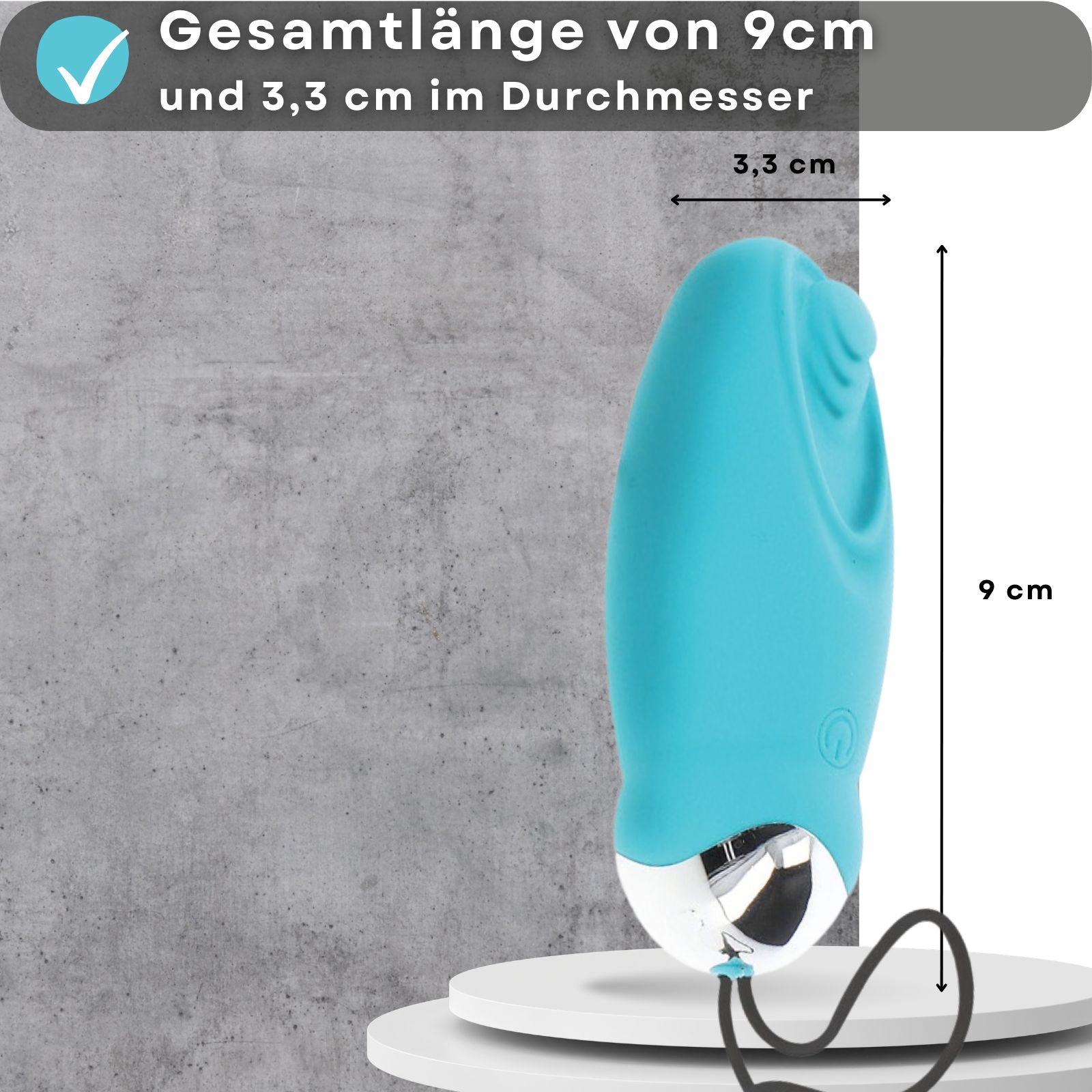 Blaues Vibrations-Ei. Länge 9 cm, Durchmesser 3,3 cm. Mit weißem Sockel und schwarzem Kabel.