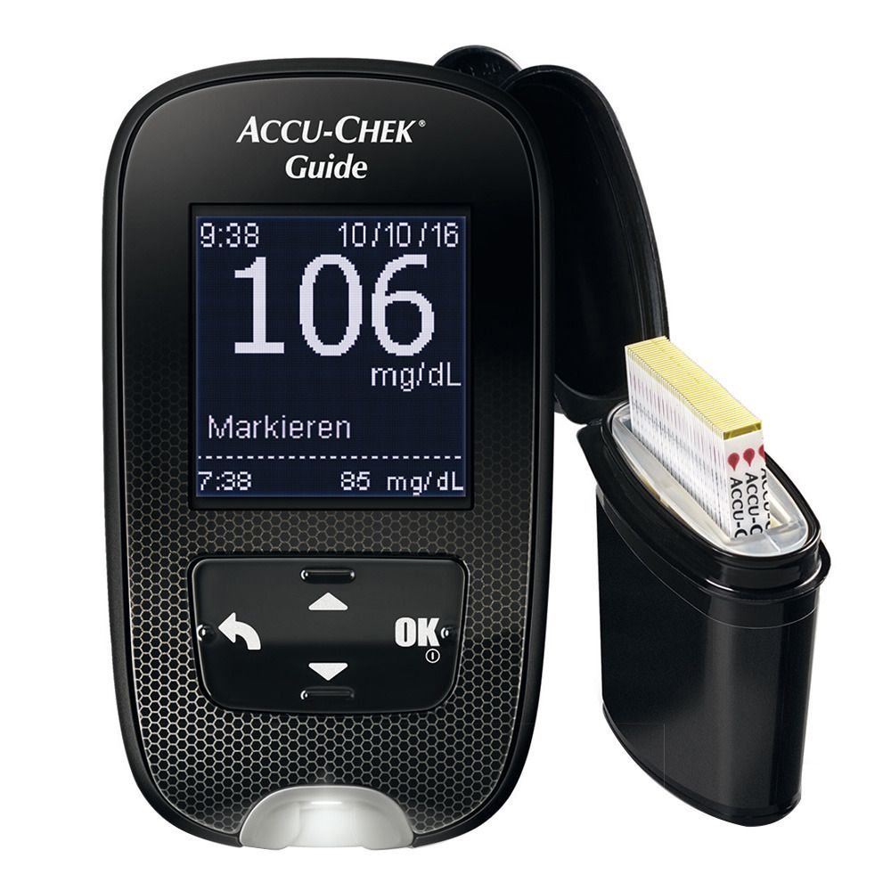 Blutzuckermessgerät ACCU-CHEK Guide mit Display. Schwarzes Gehäuse, offene Teststreifendose.