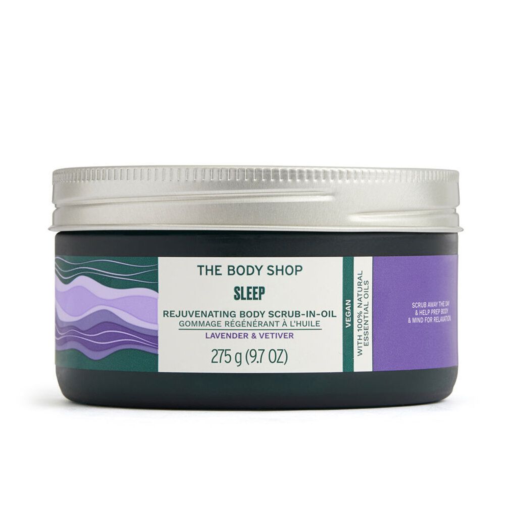 Dunkelgrüner Tiegel mit silbernem Deckel. Aufschrift: Sleep, Rejuvenating Body Scrub-in-Oil, Lavendel & Vetiver. 275 g.