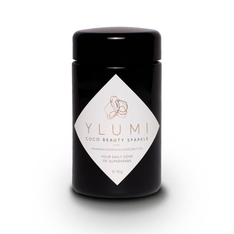 Schwarzes Glas mit weißem Etikett. Aufschrift: YLUMI COCO BEAUTY SPARKLE. 70g. Nahrungsergänzungsmittel.