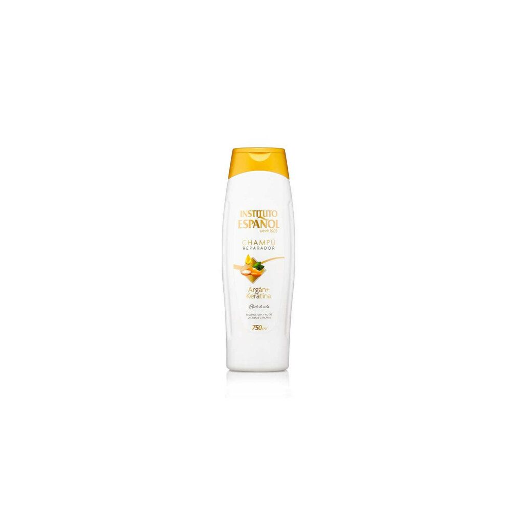 Weißes Shampoo mit gelbem Deckel. Aufschrift: Instituto Español, Champú Reparador, Argan + Keratina. 750ml.