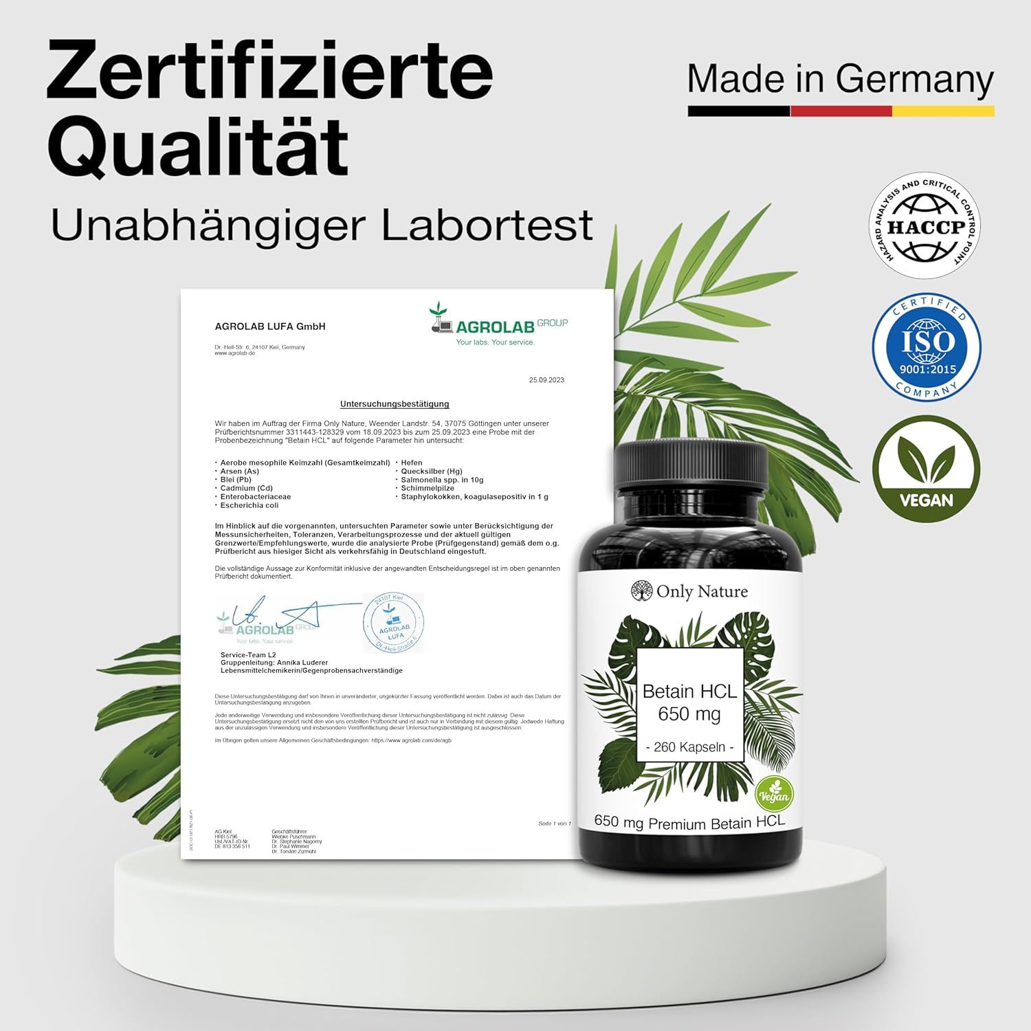 Flasche "Betain HCL 650 mg" neben einem Zertifikat. Siegel "Made in Germany", "Vegan", ISO und HACCP.