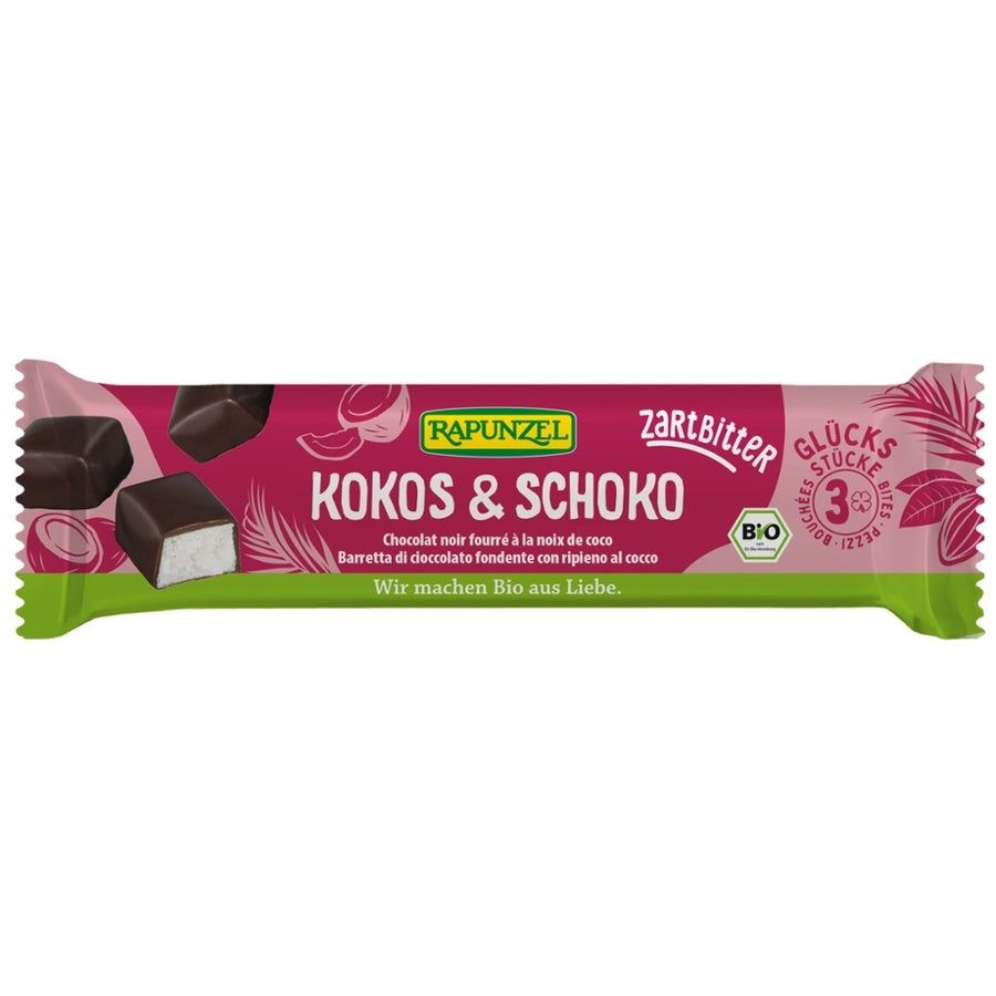 Verpackung von Rapunzel Glücksstücke Kokos & Schoko Zartbitter. Rosa-grüne Verpackung mit Produktnamen, Kokos- und Schokoladenabbildungen und Bio-Siegel.