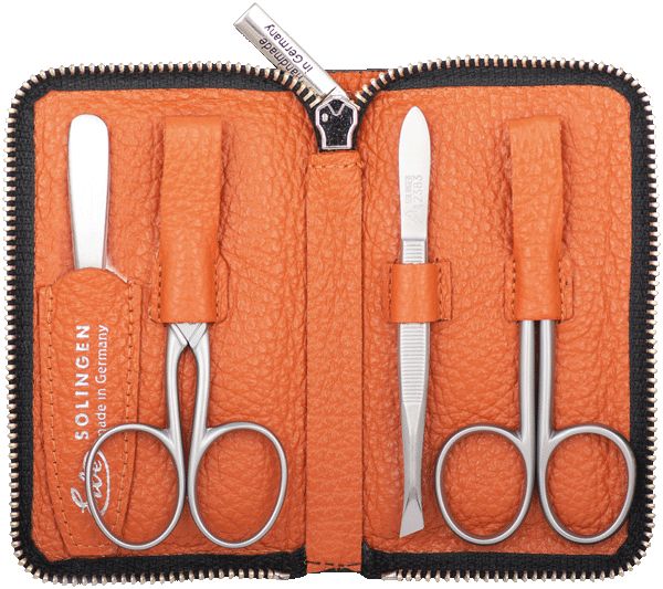 Offenes orangefarbenes Lederetui mit Reißverschluss, gefüllt mit Maniküre-Werkzeugen. Enthält Schere, Pinzette und Nagelwerkzeuge. Marke: Solingen.