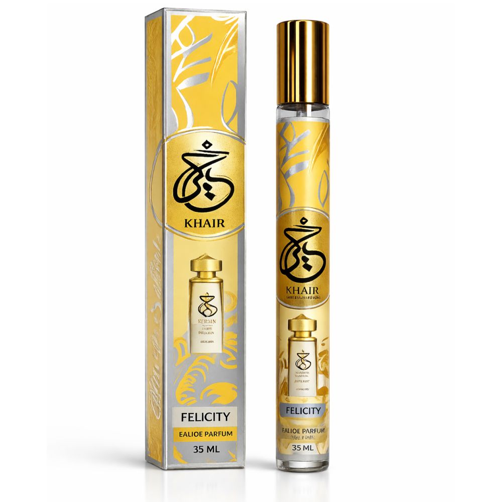 Parfümflasche und Verpackung. Aufschrift 'Khair Felicity Eau de Parfum'. Goldene und silberne Elemente.