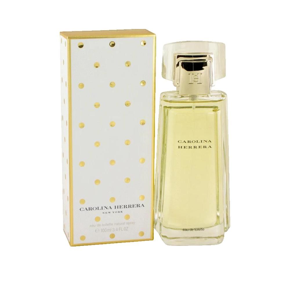 Flakon und Verpackung von Carolina Herrera Femme EdT. Weißer Karton mit goldenen Punkten. Flakon mit transparentem Deckel.