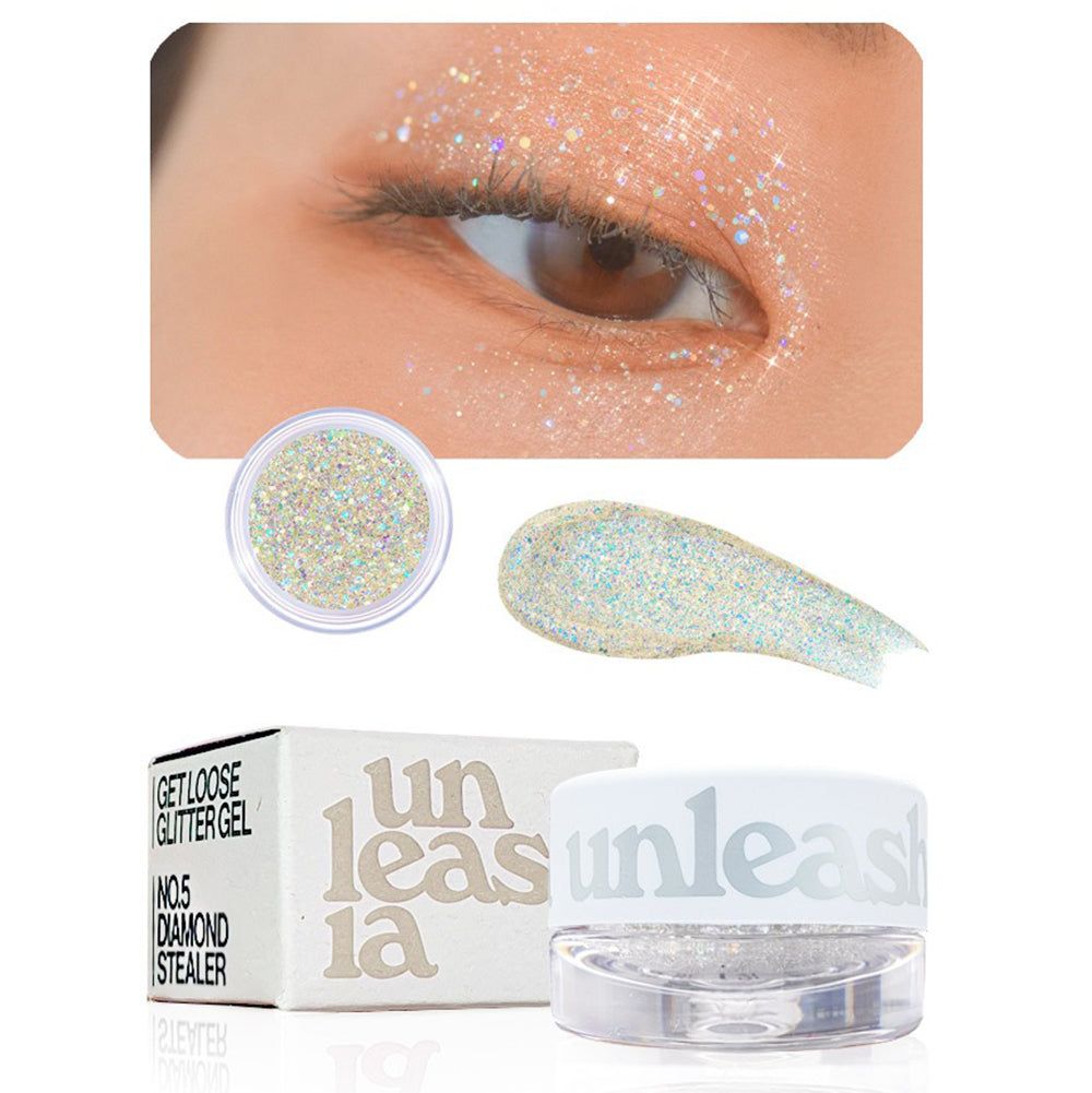 Glitzergel in einem kleinen Tiegel mit Applikator und Verpackung. Zeigt schimmernden Lidschatten auf einem Auge.