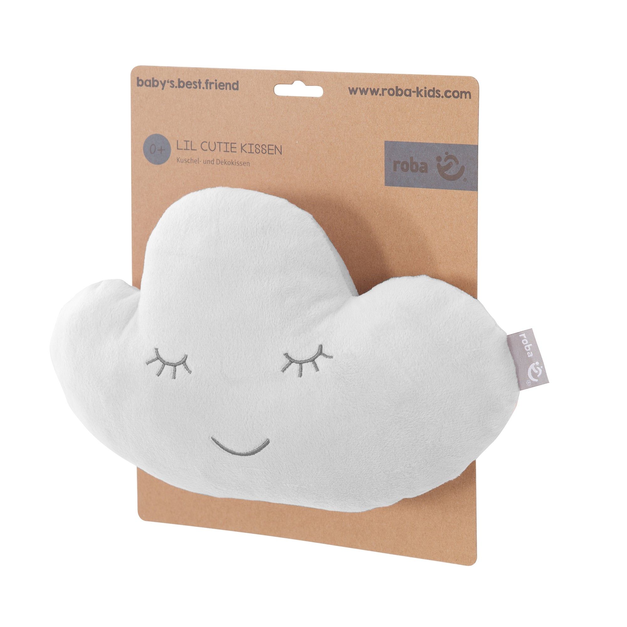 Weißes Wolkenkissen in Verpackung. Kissen mit geschlossenen Augen und lächelndem Mund. Marke roba.