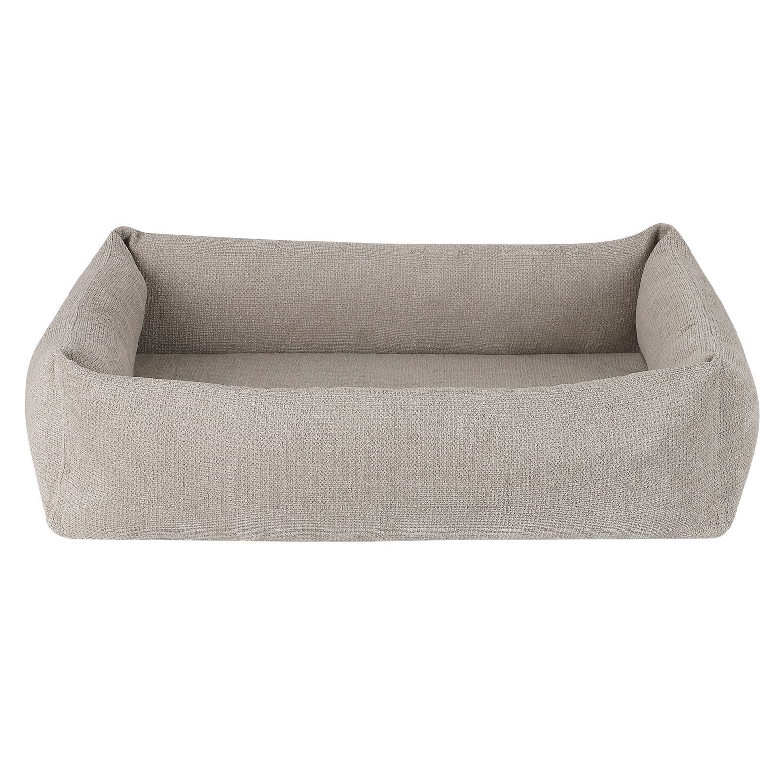 Beige Hundebett mit erhöhten Seiten. Rechteckige Form, Stoffstruktur.