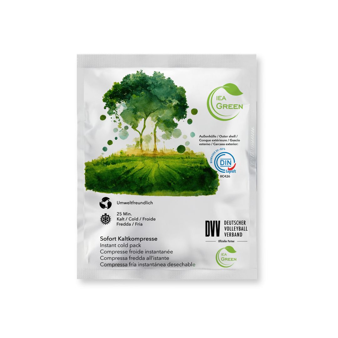 Kältekompresse mit IEA Green Logo. Verpackung mit Baum-Motiv, DIN-Zertifizierung und Text. Sofort Kältekompresse.