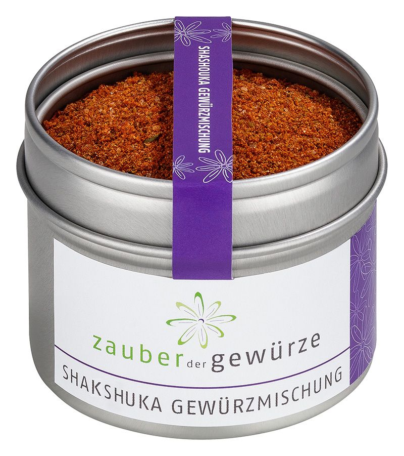 Gewürzmischung in Dose. Dose mit Deckel, weißem Etikett und lila Band. Aufschrift: Zauber der Gewürze, Shakshuka Gewürzmischung.
