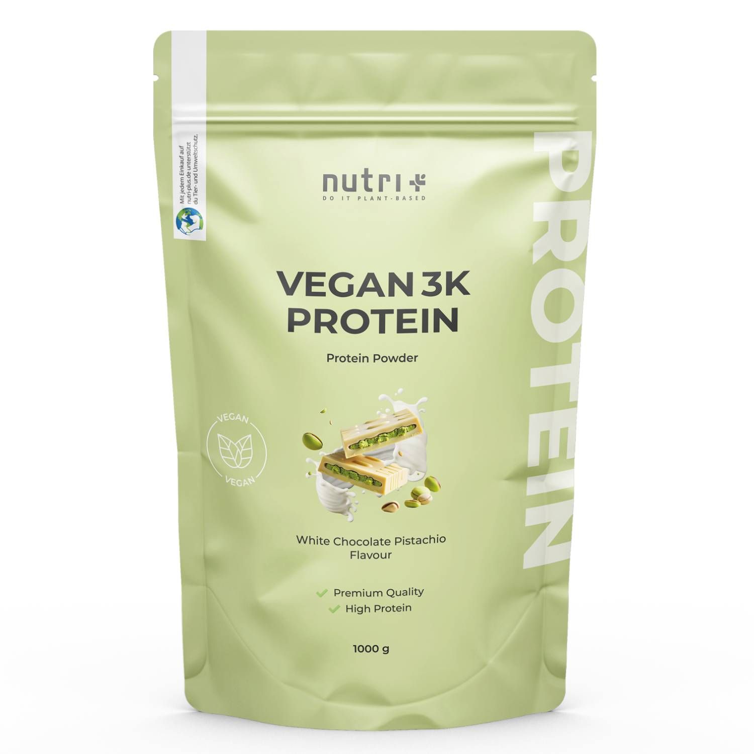 Grüne Verpackung mit 'nutri+' Logo und 'VEGAN 3K PROTEIN'. Enthält Protein-Pulver. 'White Chocolate Pistachio' Geschmack. 1000g.