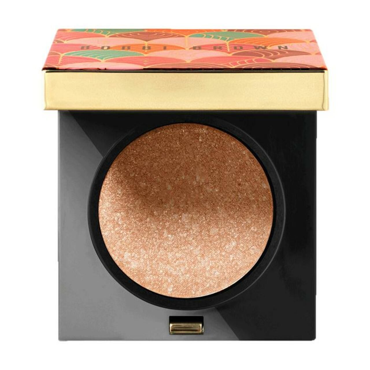 Quadratische Bobbi Brown Lidschatten-Palette. Schwarzer Behälter mit goldenem Rand. Deckel mit farbenfrohem Muster. Lidschatten in einem Kreis.