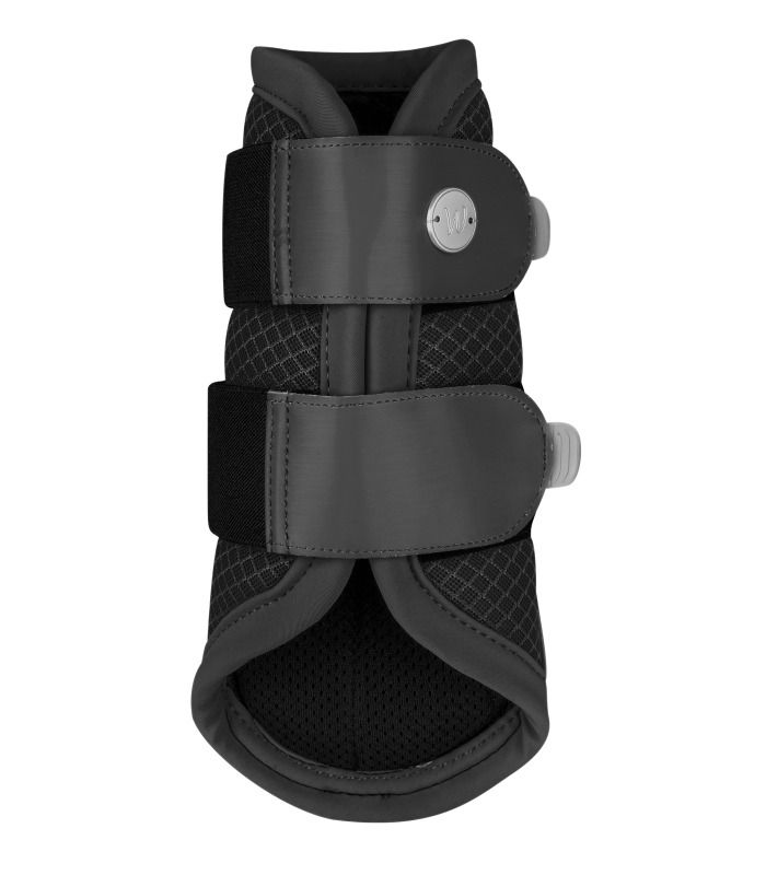 Schwarze Dressurgamasche mit Klettverschlüssen und Logo. Mesh-Gewebe und gepolsterte Bereiche. Detailansicht.