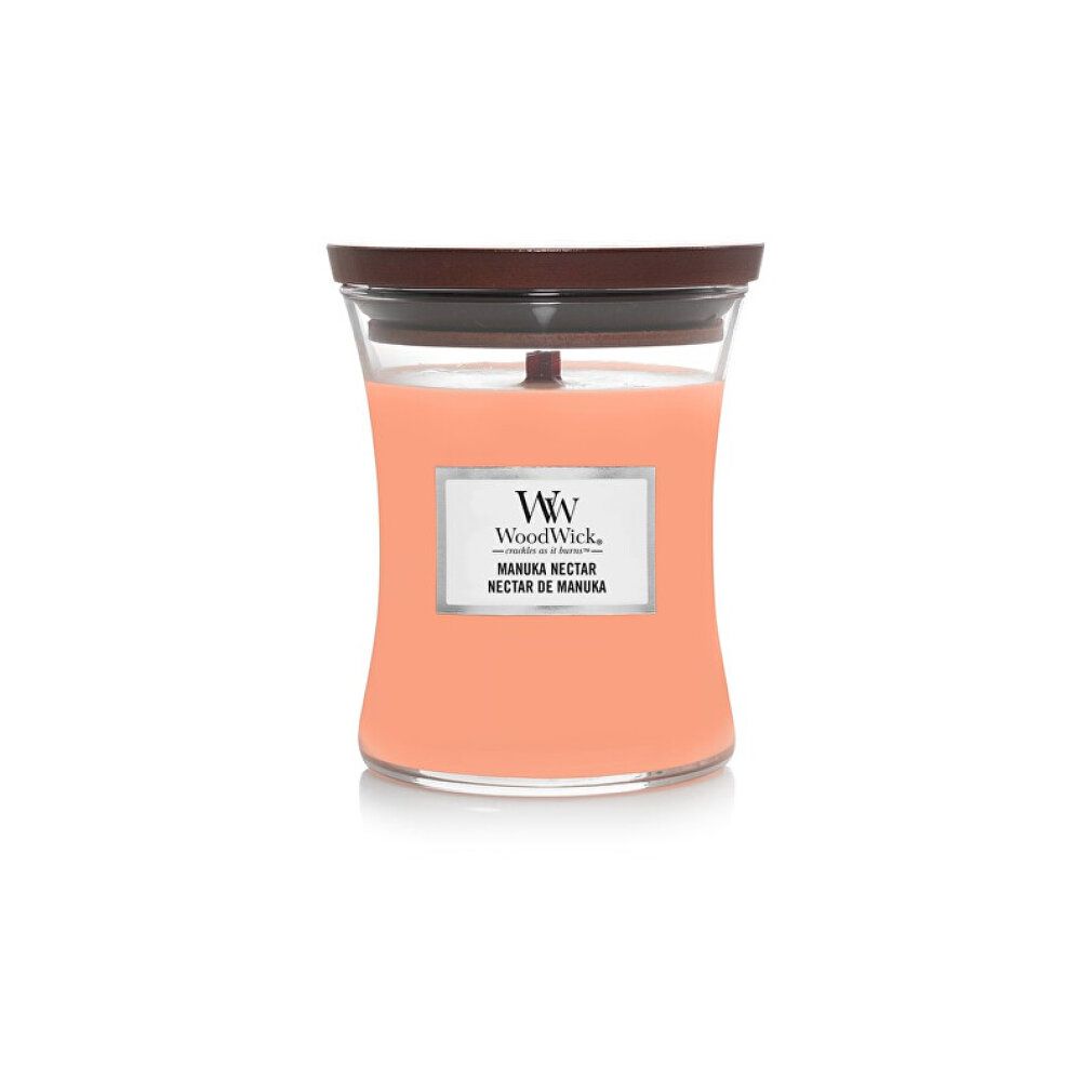 Glasbehälter mit rosa Inhalt und Holzdeckel. Etikett mit "WoodWick" und "Manuka Nectar".
