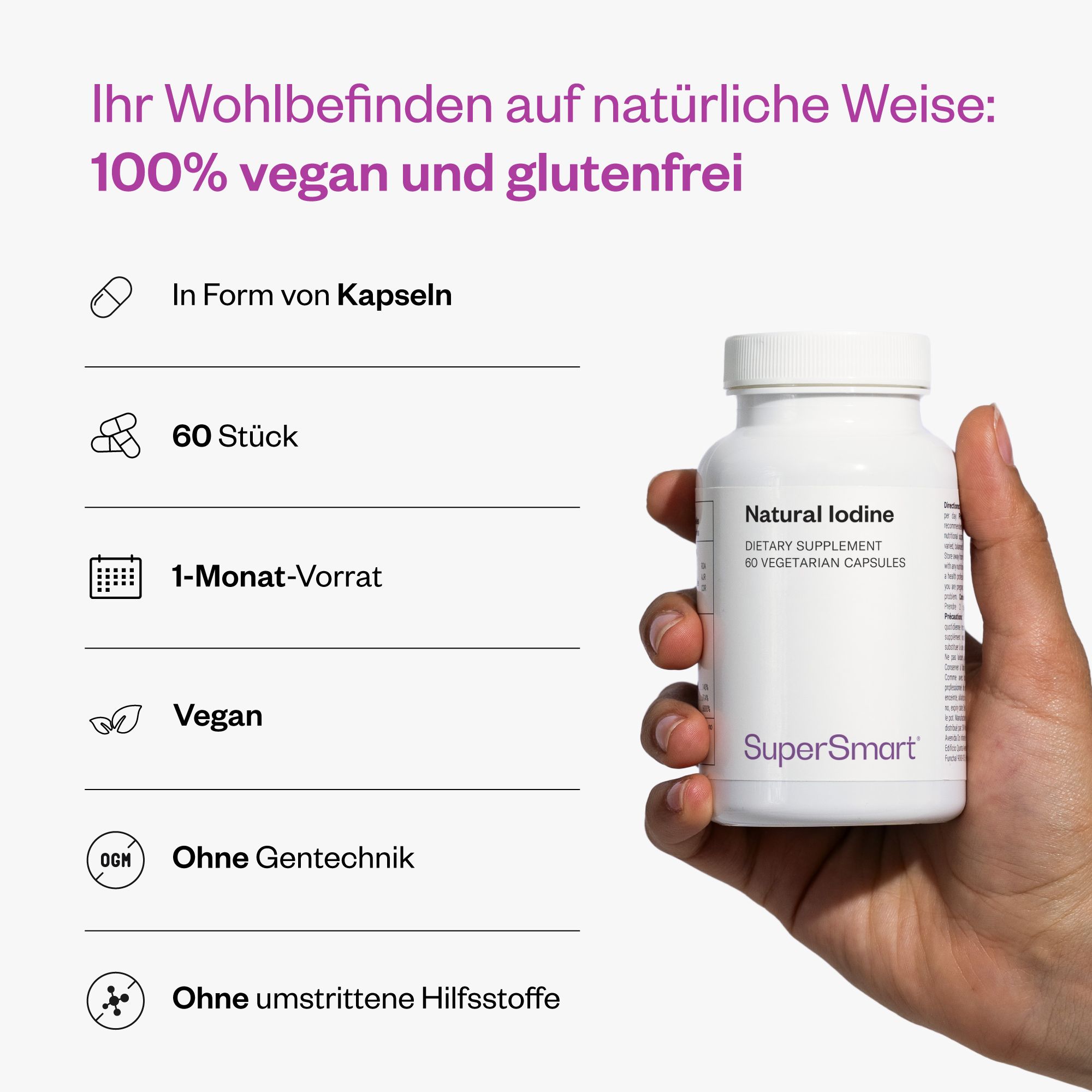 Person hält eine weiße Flasche mit 'Natural Iodine' und 'SuperSmart'. 60 Kapseln, 1-Monats-Vorrat. Vegan, ohne Gentechnik.