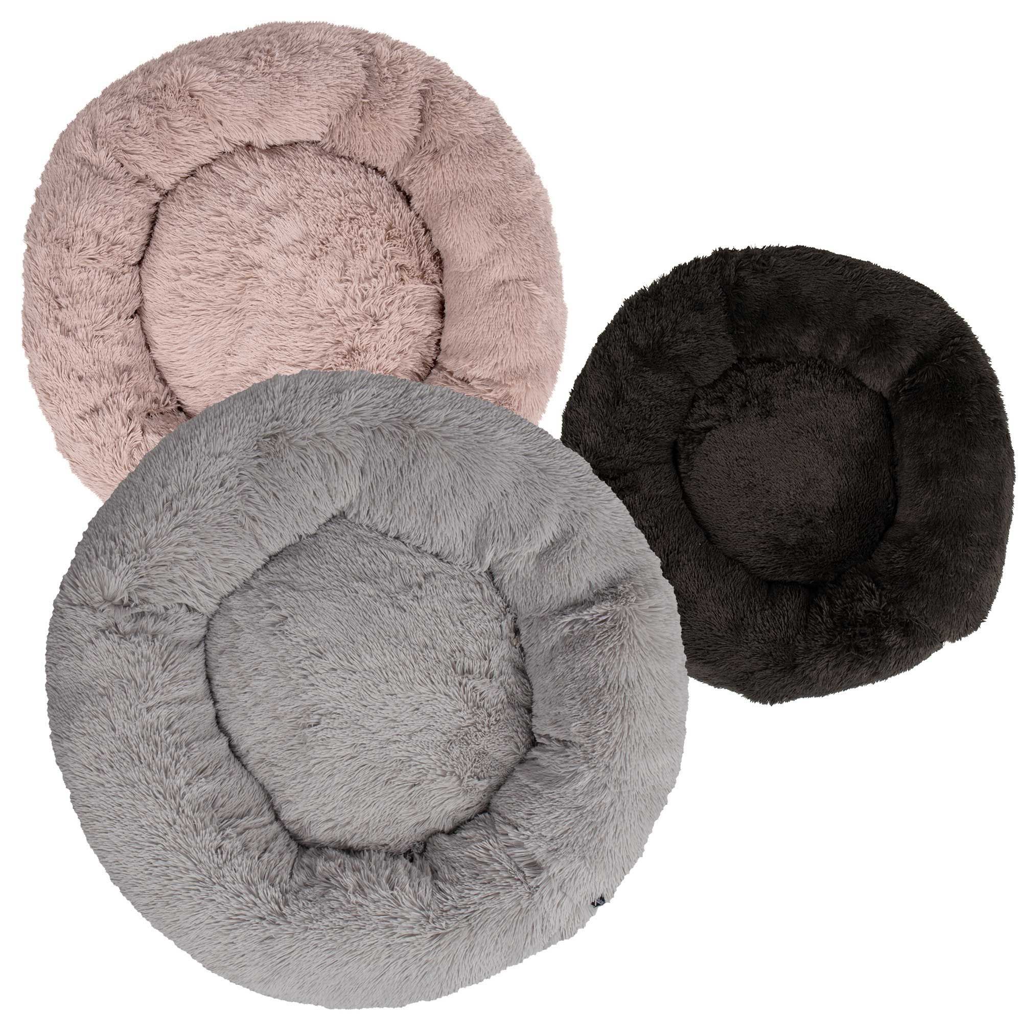 Drei Hundebetten in Donutform. Farben: rosa, grau und schwarz. Weiches, flauschiges Material.