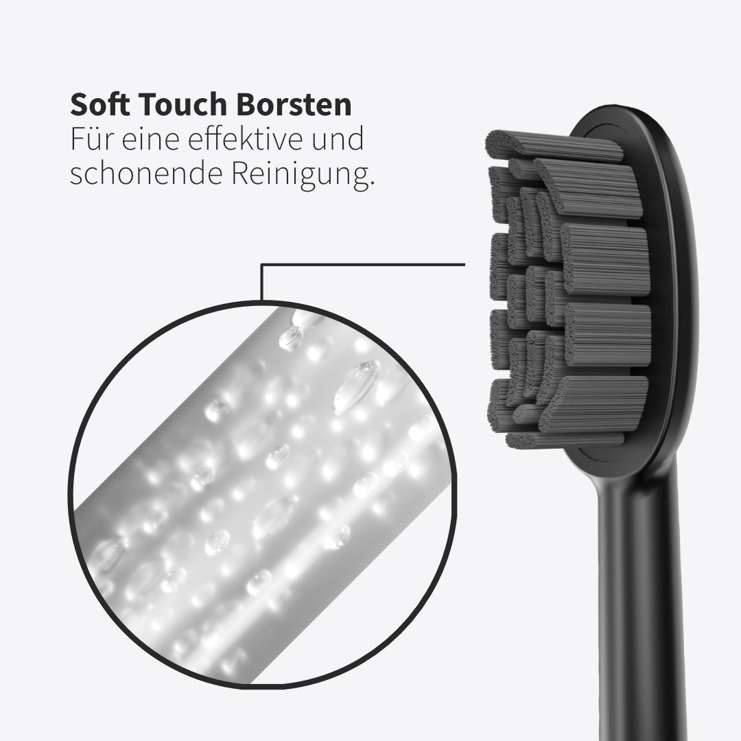Schwarzer Bürstenkopf mit Detailansicht der Borsten. Text: Soft Touch Borsten. Für eine effektive und schöne Reinigung.