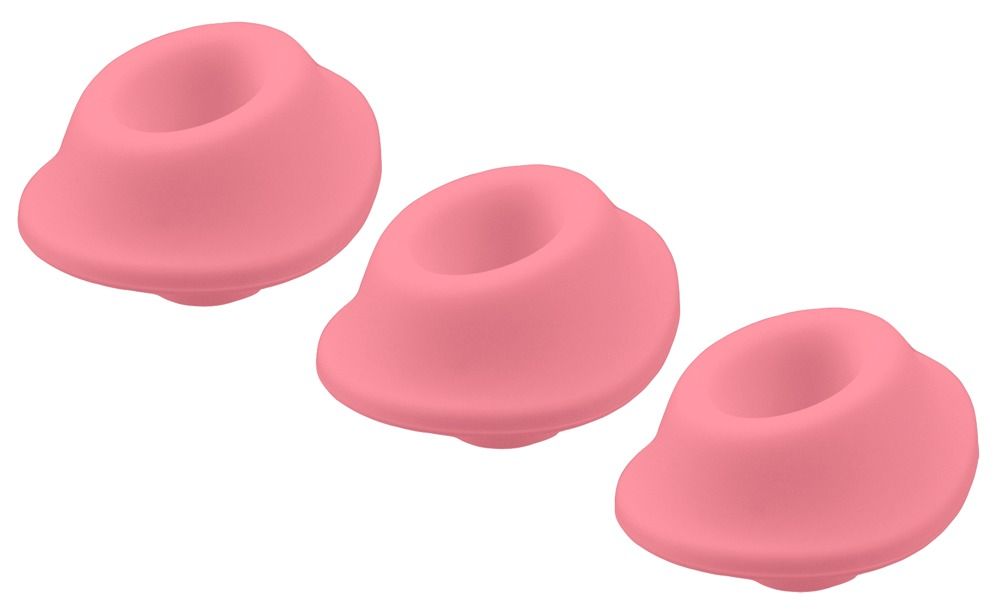 Drei rosa Ersatzköpfe. Runde Form mit zentraler Öffnung. Auf weißem Hintergrund.
