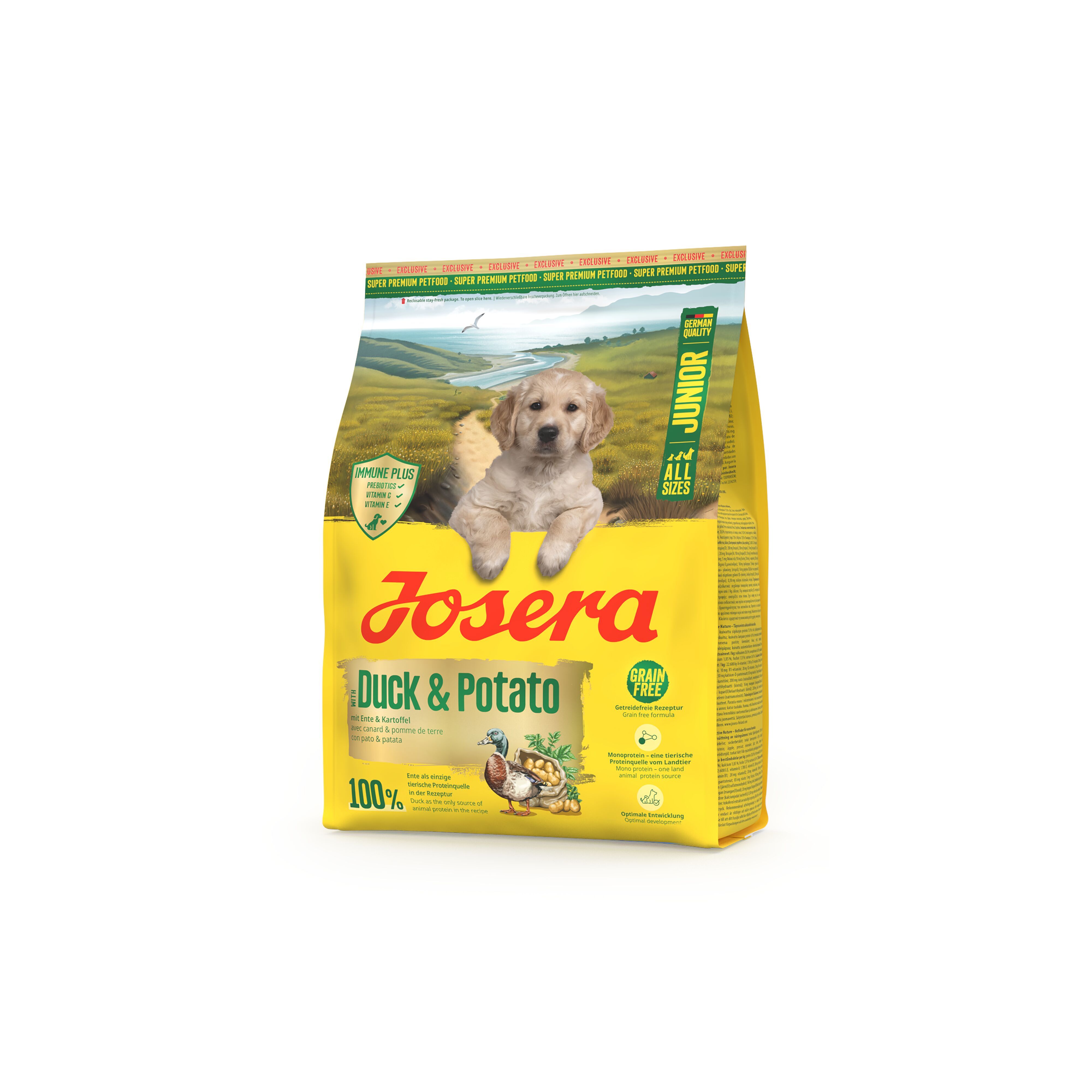 Gelbe Verpackung mit Produktnamen JOSERA Junior Duck & Potato. Abbildung eines Welpen. Grün-gelbes Design mit Logo und Text.