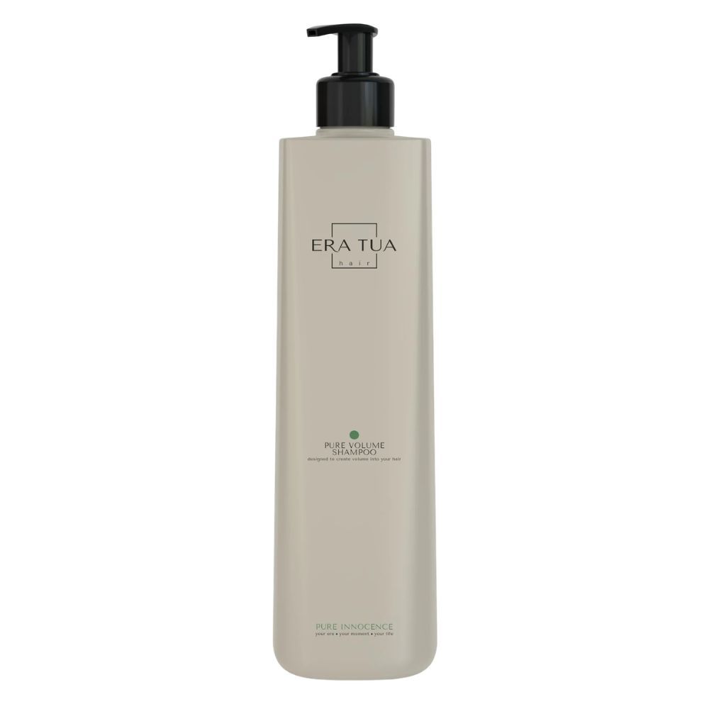 Beige Shampoo-Flasche mit schwarzem Pumpverschluss. Text: Era Tua, Pure Innocence Shampoo. Grüner Punkt.