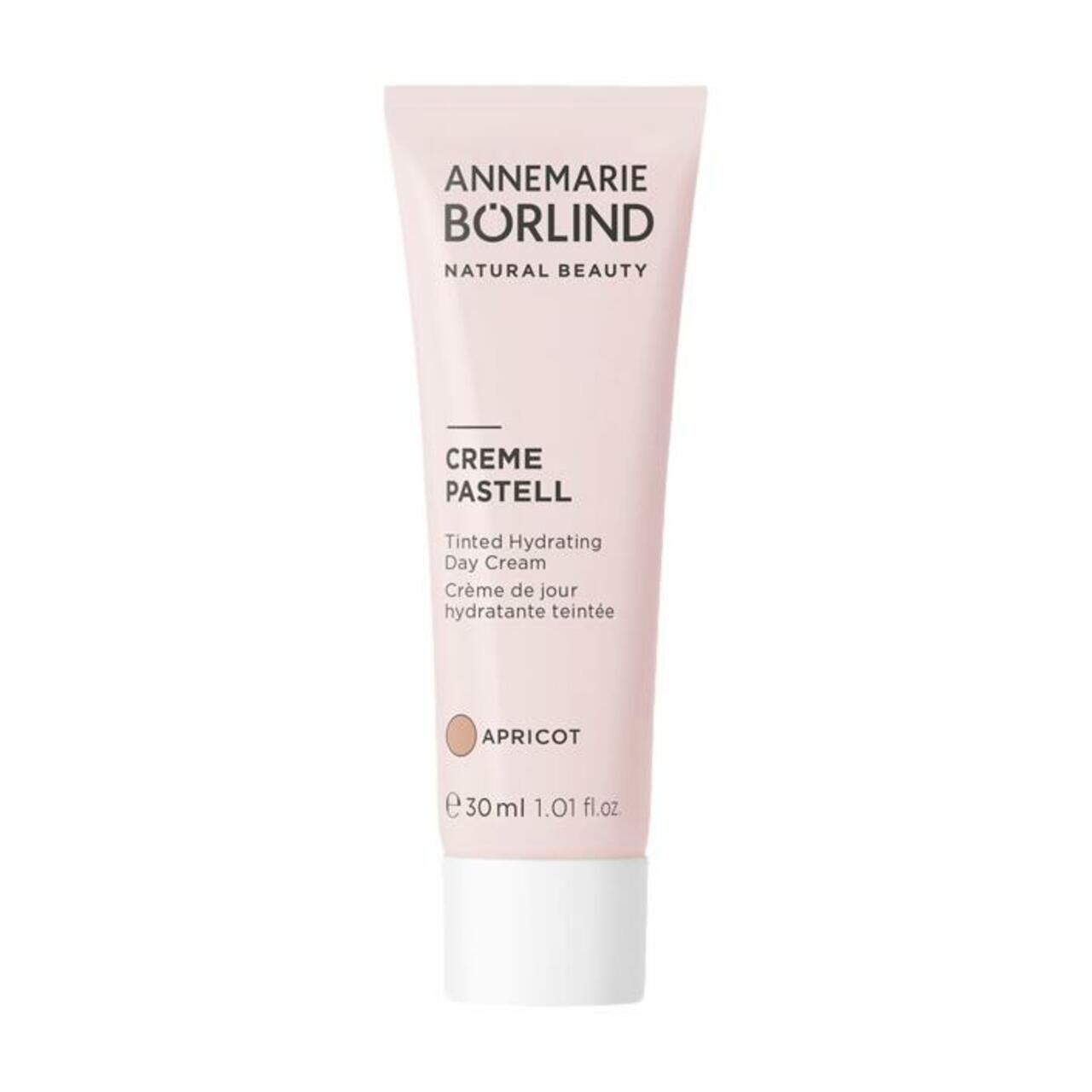 Rosa Tube mit Creme Pastell Day Cream. Marke Annemarie Börlind. Text: Tinted Hydrating Day Cream, Apricot. 30 ml.