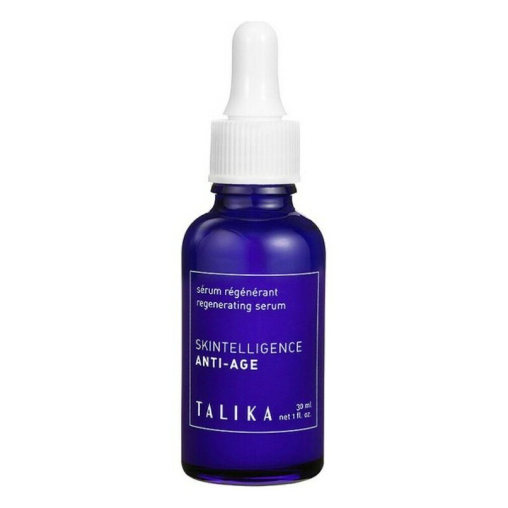 Blaue Glasflasche mit weißem Tropfer. Aufschrift: Skintelligence Anti-Age, Talika. Regenerierendes Serum.