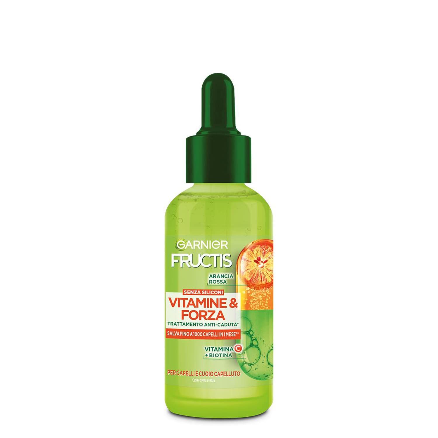 Grüne Flasche mit Tropfer. Aufschrift: Garnier Fructis Vitamine & Kraft. Enthält Vitamin C und Biotin. Für Haare und Kopfhaut.