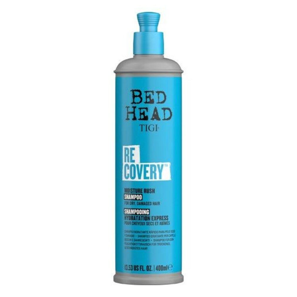 Türkis-farbene Shampoo-Flasche mit blauem Pumpkopf. Aufschrift: BED HEAD TIGI RECOVERY MOISTURE RUSH SHAMPOO.