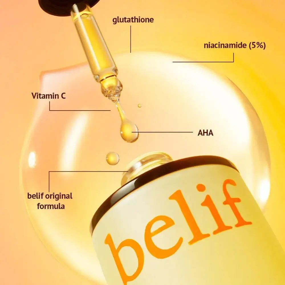 Pipette tropft Serum mit Niacinamid und Vitamin C auf Flasche.