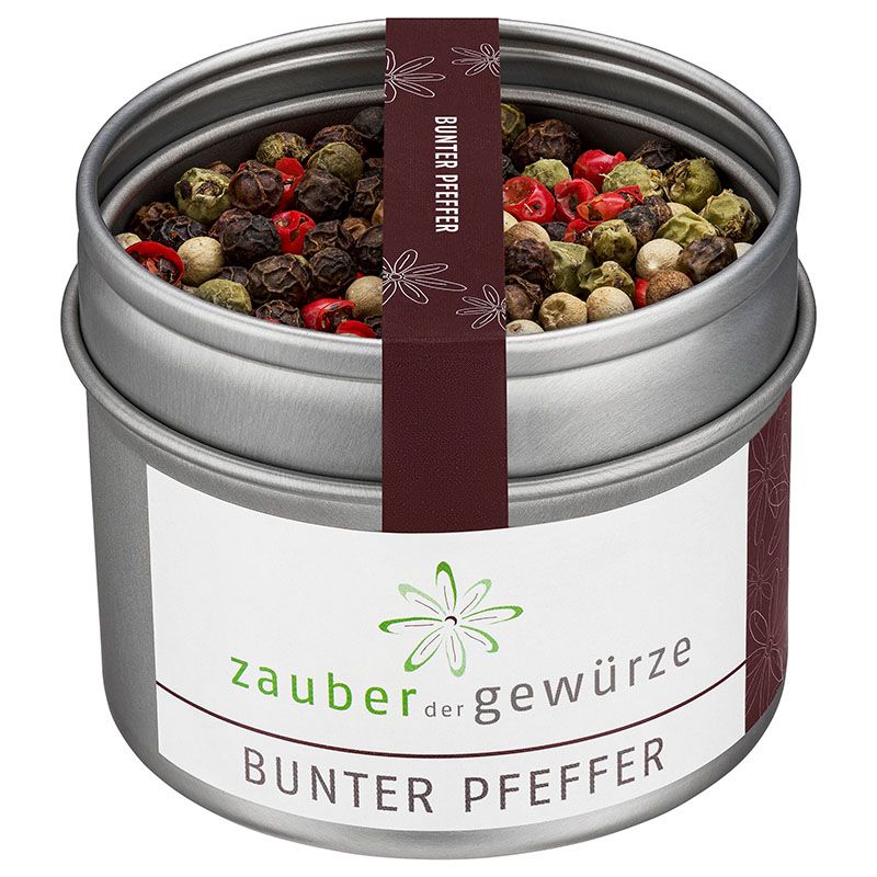 Metallbehälter mit buntem Pfeffer. Etikett mit "Zauber der Gewürze Bunter Pfeffer". Dunkelrotes Band mit "Bunter Pfeffer".
