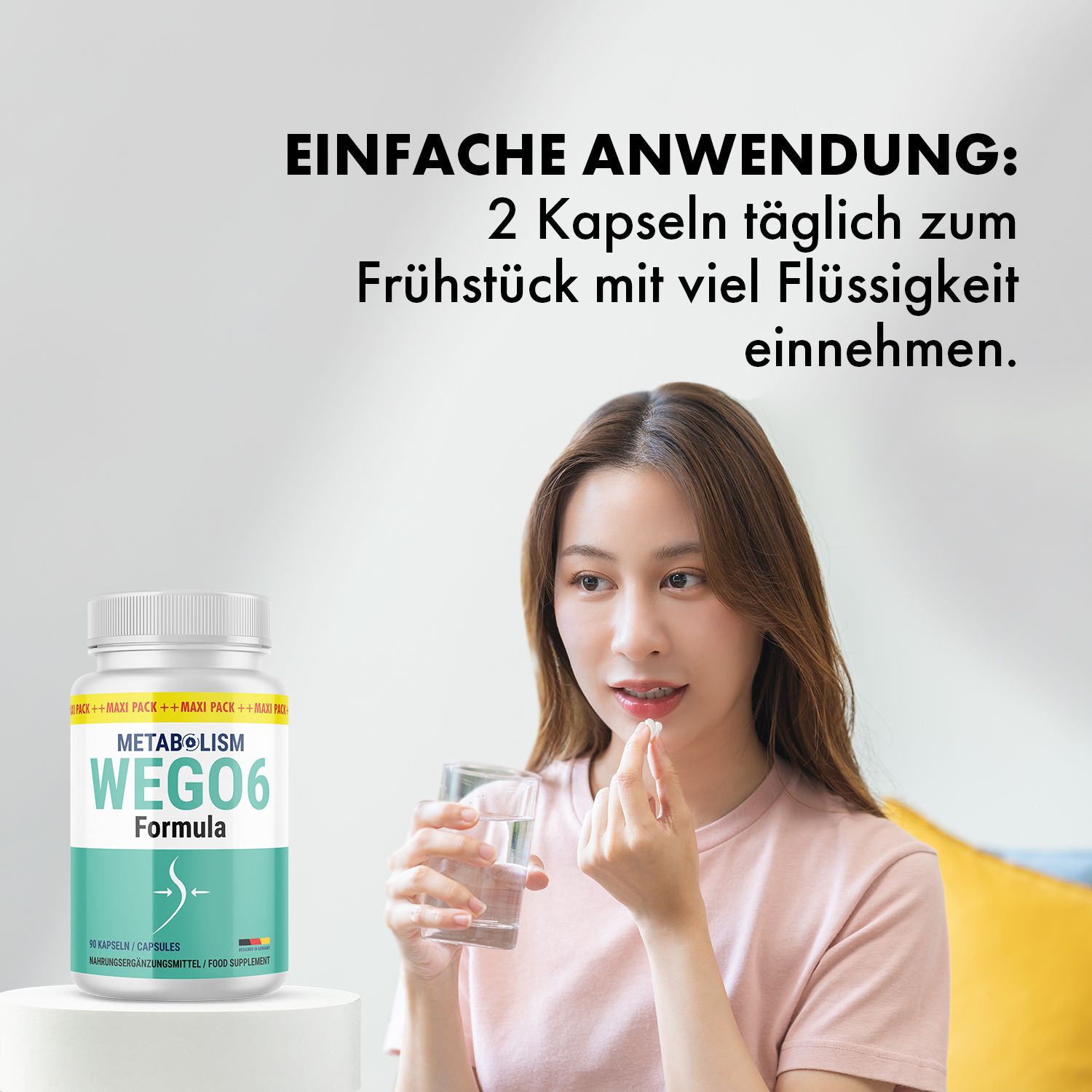 Frau nimmt Kapsel mit Wasser ein. Dose mit Produktnamen: Metabolism Wego6 Formula. Text: 2 Kapseln täglich zum Frühstück mit viel Flüssigkeit.