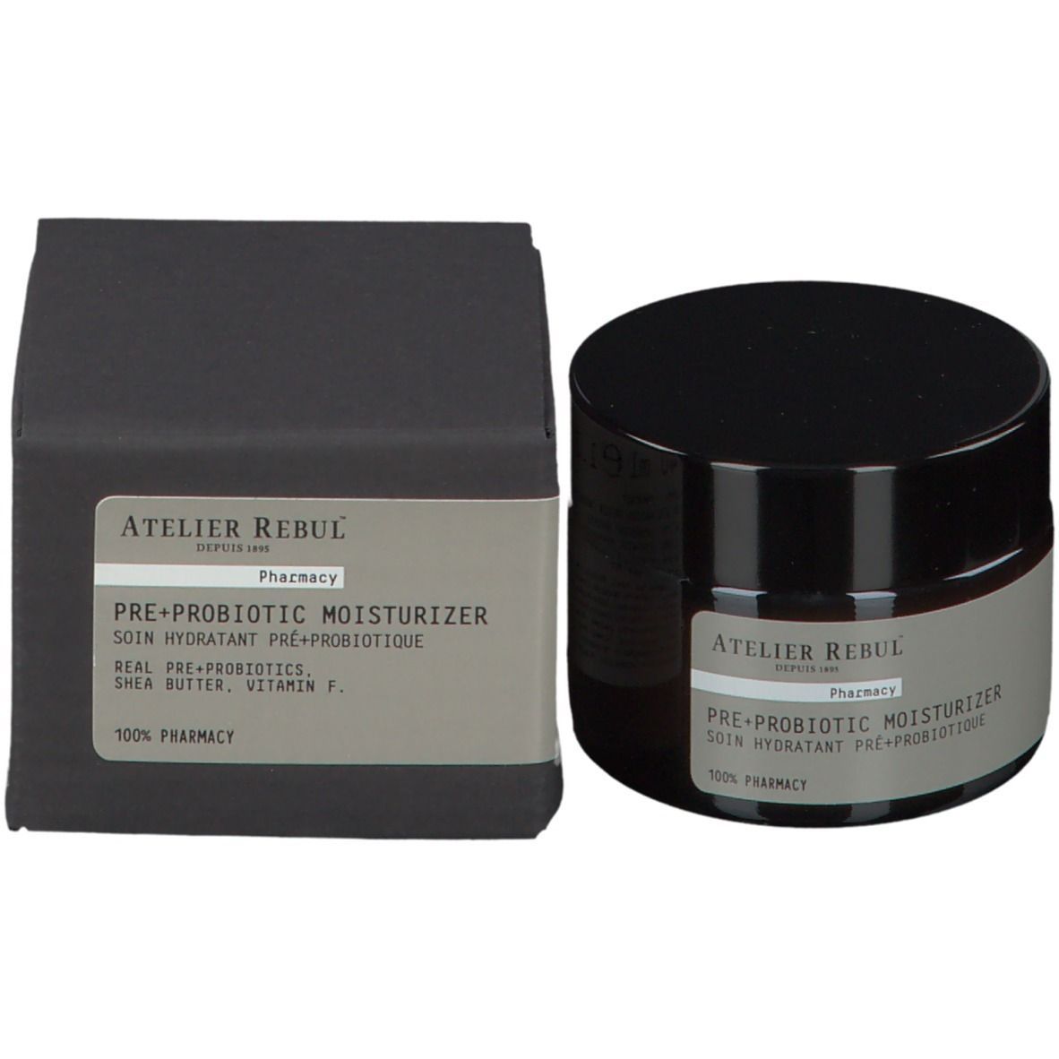 Crèmepot en doos. Op de pot staat: ATELIER REBUL PRE+ PROBIOTIC MOISTURIZER. Op de doos staat: ATELIER REBUL.