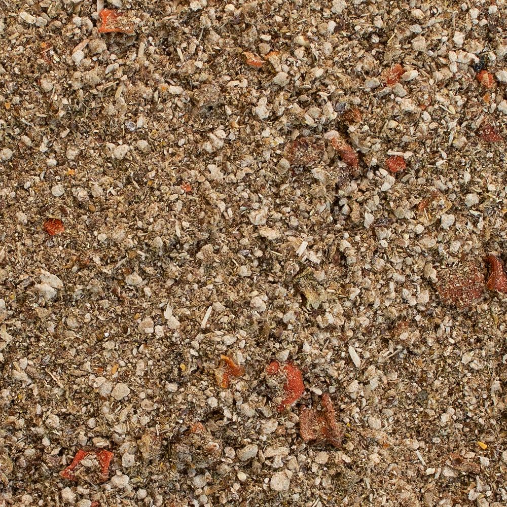 Nahaufnahme von körnigem Produkt. Verschiedene Farben und Texturen. Kleine, unregelmäßige Partikel.