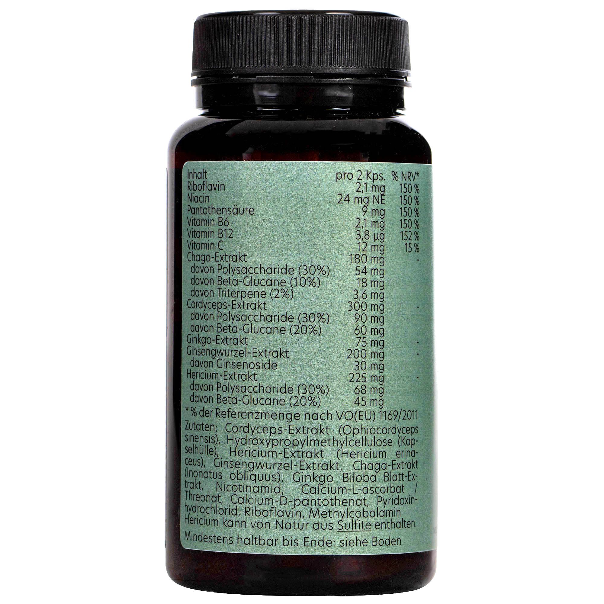 Braune Flasche mit grünem Etikett. Aufschrift: Inhaltsstoffe und Nährwertangaben. Enthält Vitamine und Pflanzenextrakte.