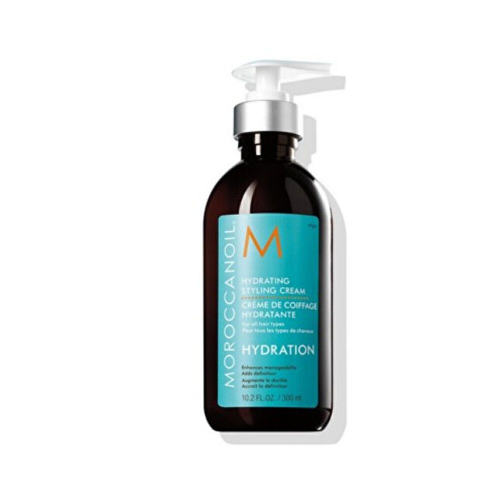 Braune Flasche mit Pumpe. Aufschrift: Moroccanoil, Hydrating Styling Cream, Hydration. 10.2 FL.OZ./300 ml.