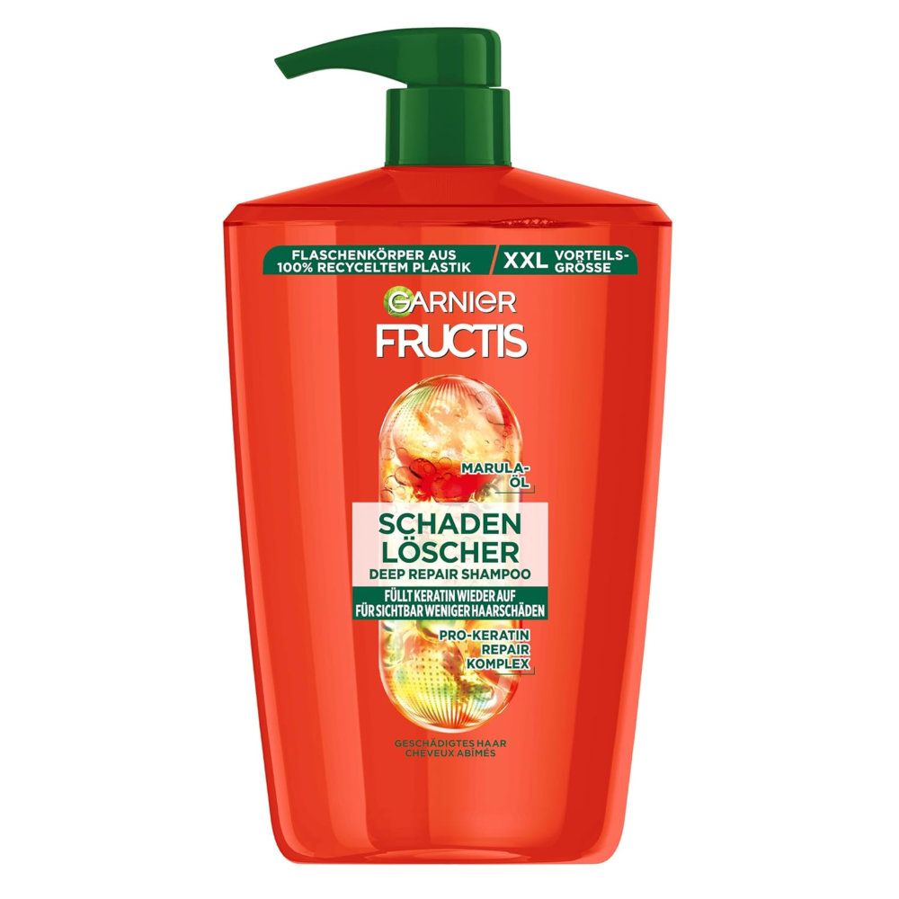 Rote Garnier Fructis Schadenlöscher XXL Shampoo-Flasche mit grünem Pumpdeckel. Text: Marula-Öl, Deep Repair Shampoo, Pro-Keratin Repair Komplex.
