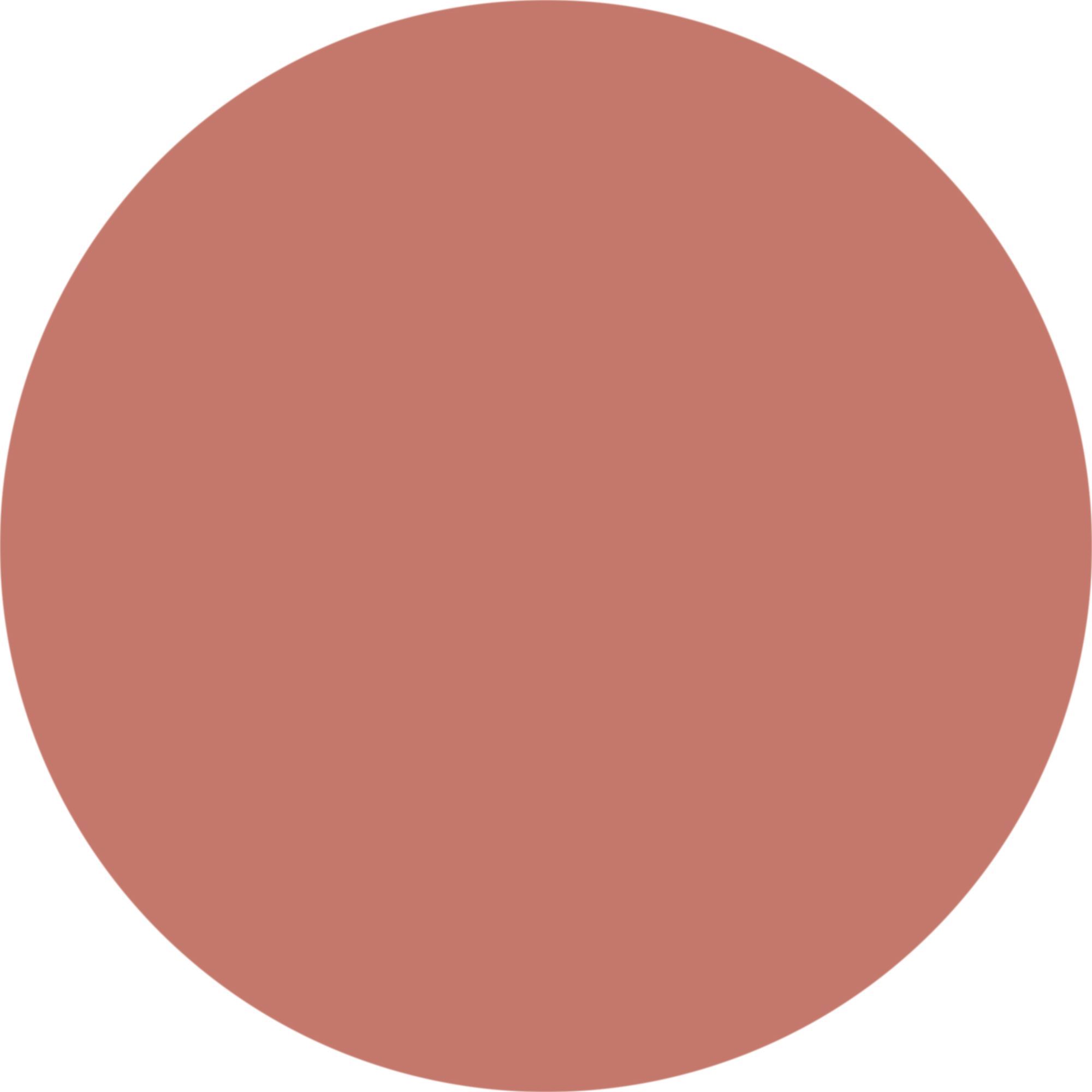 Kreisförmiger Farbfleck in Nude-Ton.