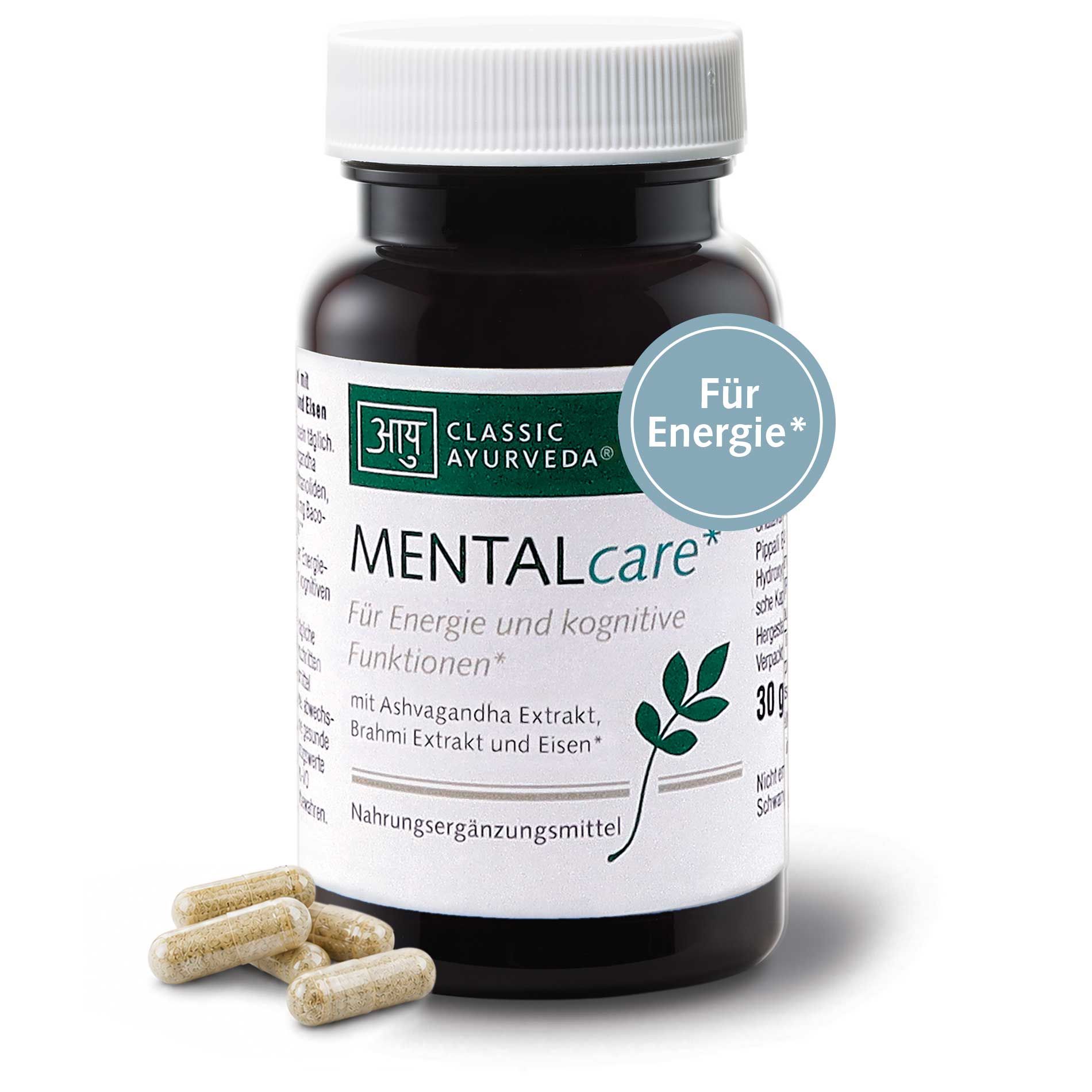 Dunkle Glasflasche mit weißem Deckel, Etikett 'Classic Ayurveda MENTALcare' für Energie. 30g. Kapseln liegen daneben.