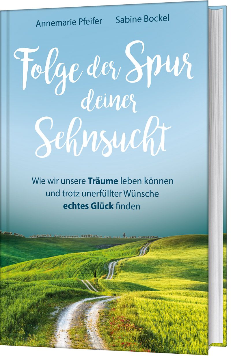 Buch mit dem Titel "Folge der Spur deiner Sehnsucht". Autoren: Annemarie Pfeifer, Sabine Bockel. Cover mit Landschaft und Weg.