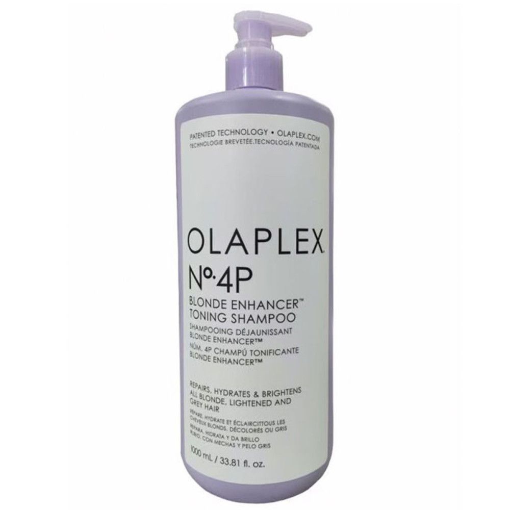 Flasche Olaplex N°4P Blonde Enhancer Toning Shampoo. Lila Flasche mit Pumpe. Text auf Etikett.
