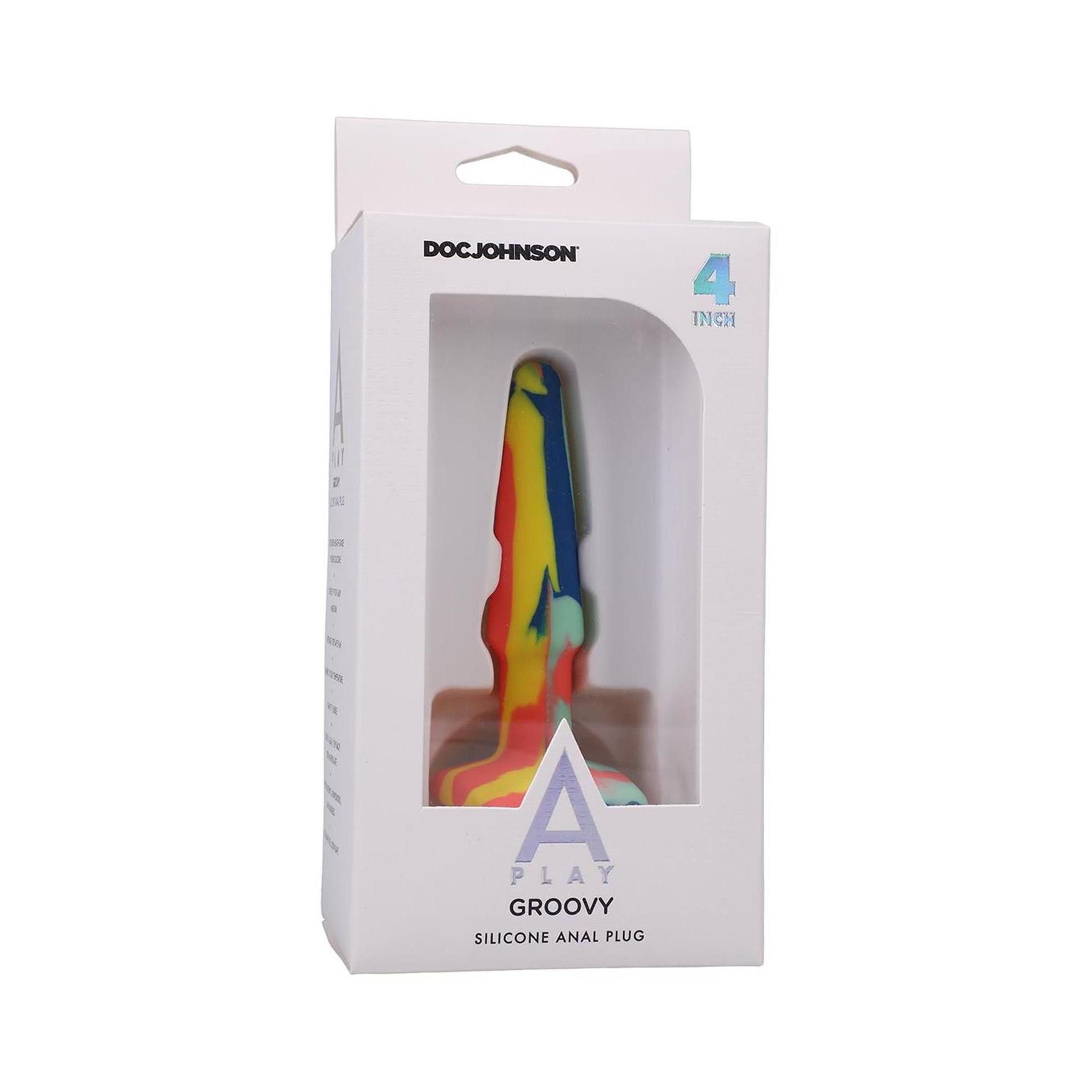Silikon-Analplug in Verpackung. Mehrfarbiges Design. Marke: Doc Johnson. Aufschrift: Groovy, 4 Inch.