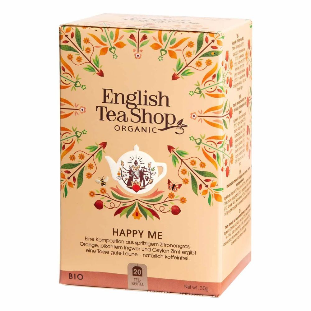 English Tea Shop Happy Me BIO Wellness-Tee-Schachtel. Aufschrift: Happy Me, Organic, BIO. 20 Teebeutel, Netto 20g.